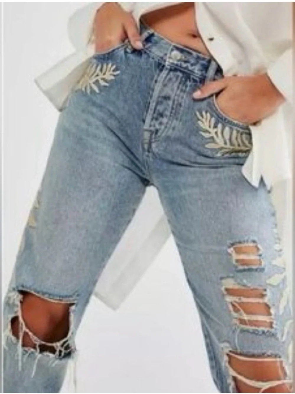 We the Free Bren distressed embroidered boyfriend jeans.